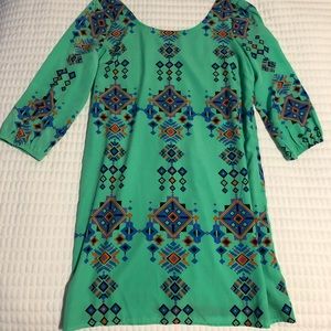 Boutique dress with V shape back